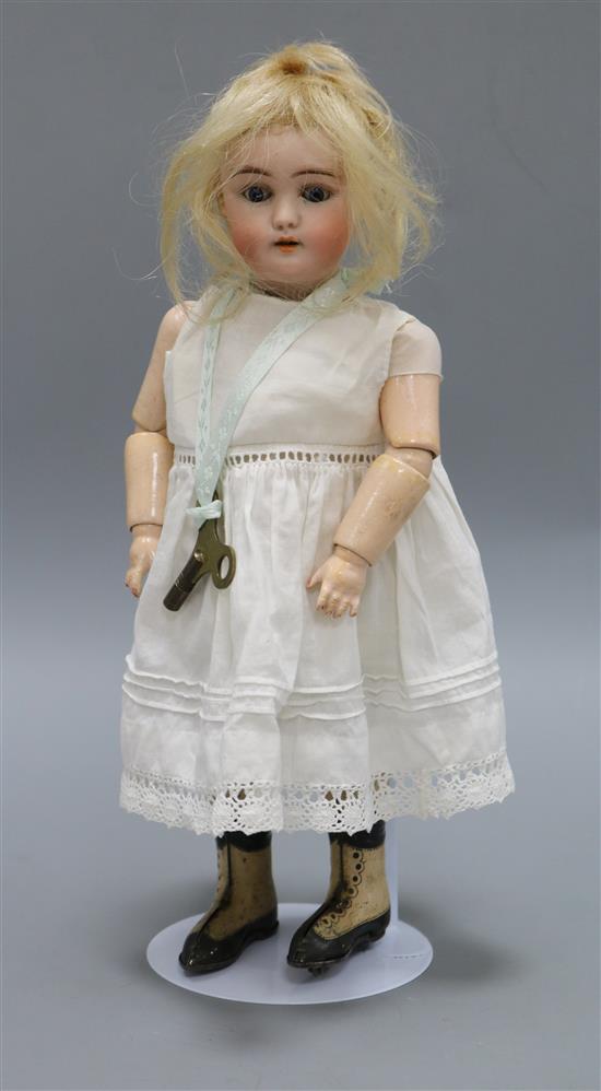 An FS & C skating doll, 12in.
